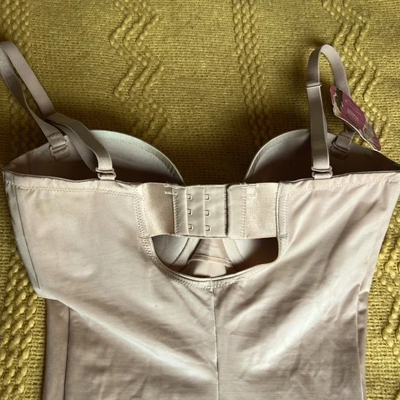 SPANX suit your fancy body suit.